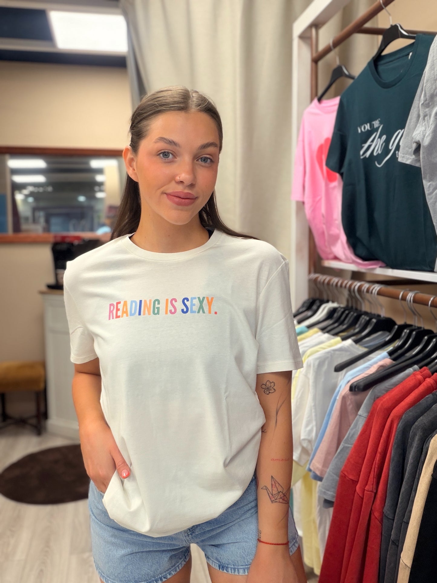 ‘READING IS …’ T-SHIRT